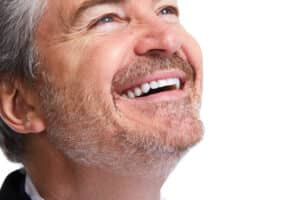 Man with healthy smile after same day tooth replacement in Sherman Oaks, CA