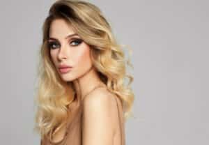 Woman with full lips after filler treatment in Pasadena, CA